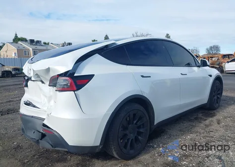 2023 Tesla Model Y Awd/Long Range Dual Motor All-Wheel Drive z USA, uszkodzony, nr VIN 7SAYGAEE9PF887623